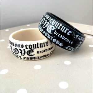 Set of 2 Juicy Couture think bangle bracelets.
